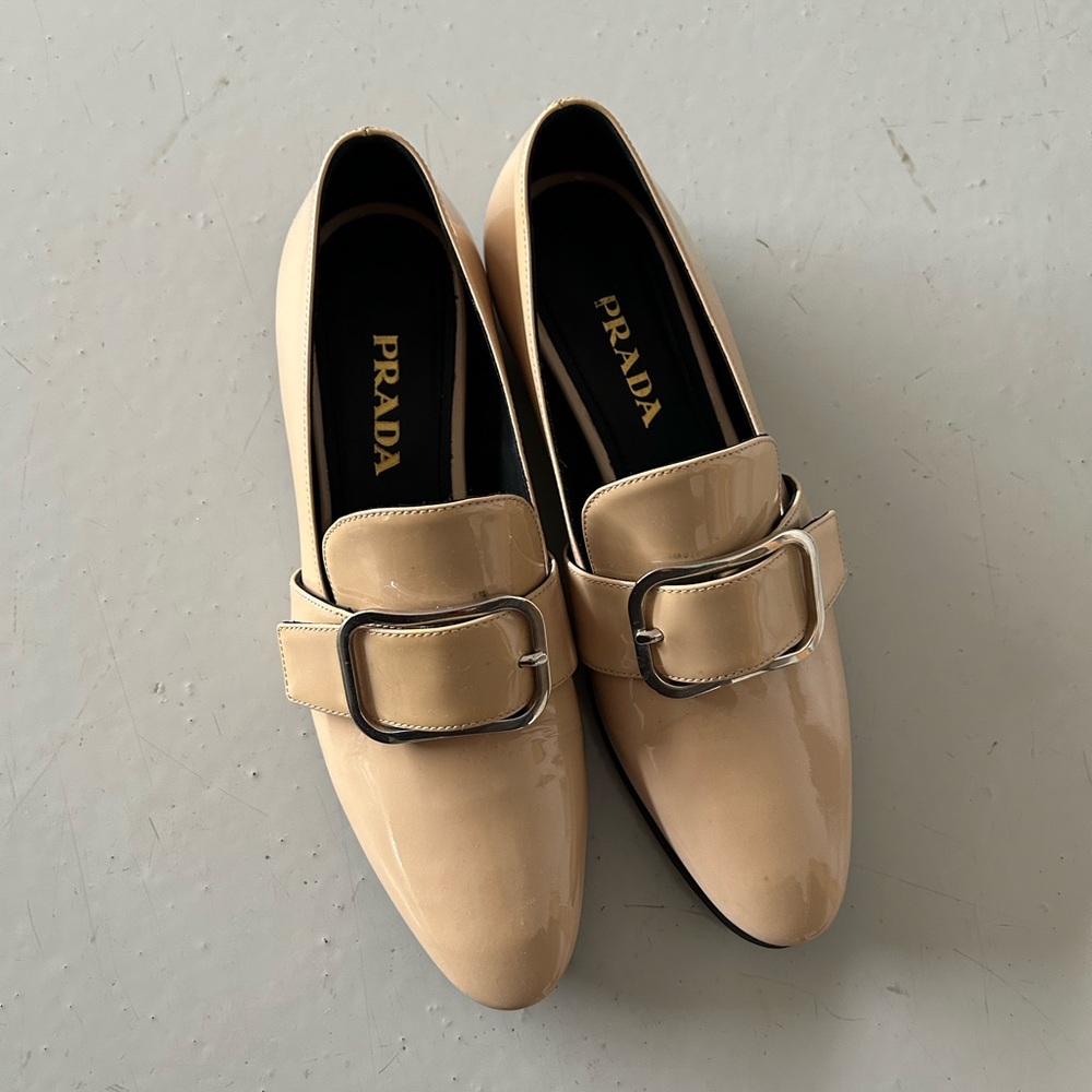 Prada Cream Loafers with Gold Buckle Detail